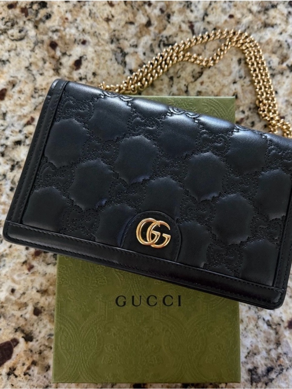 Gucci Black Quilted Leather WOC with Gold Double G - Like New